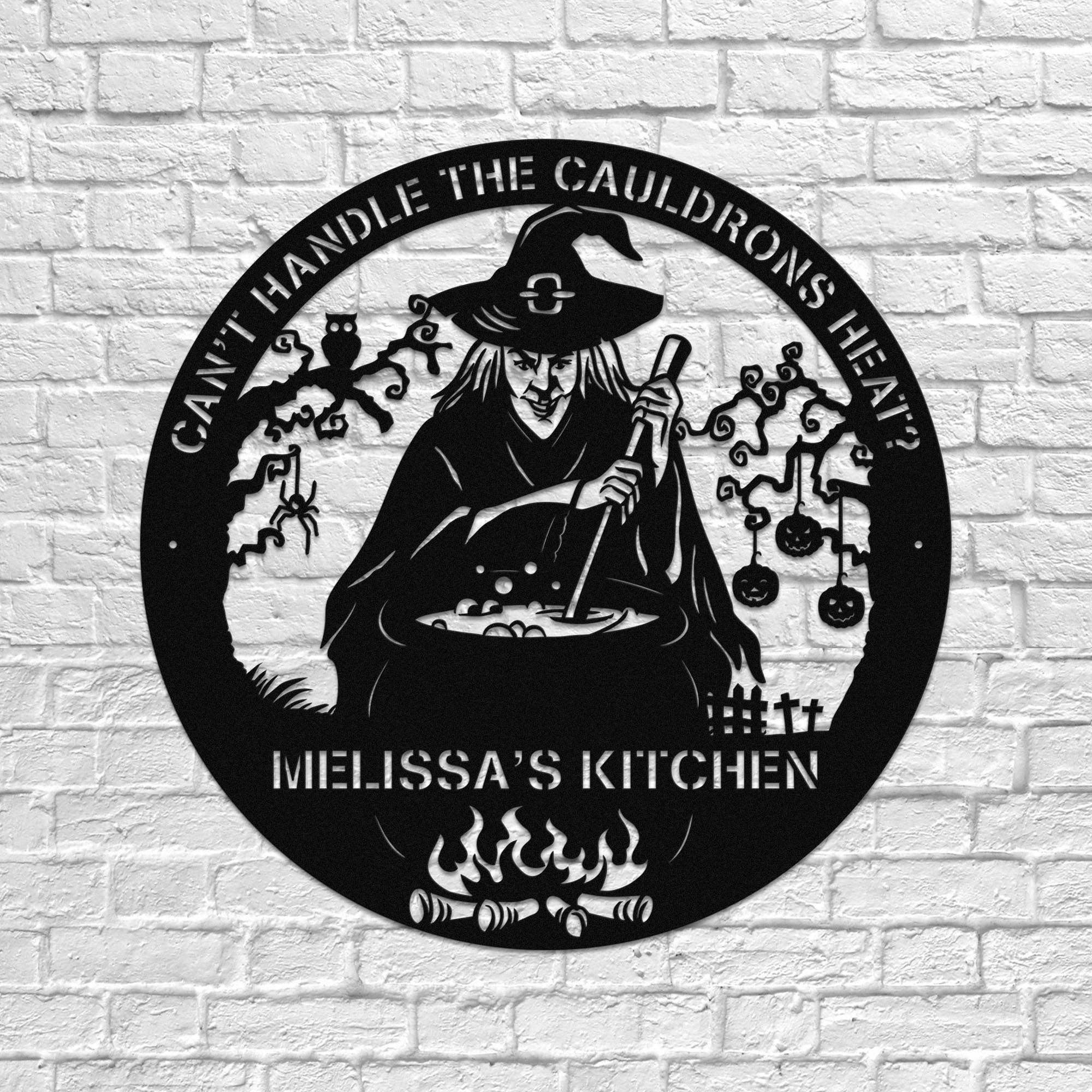 Spooky witch cauldron metal wall art for kitchen decor.